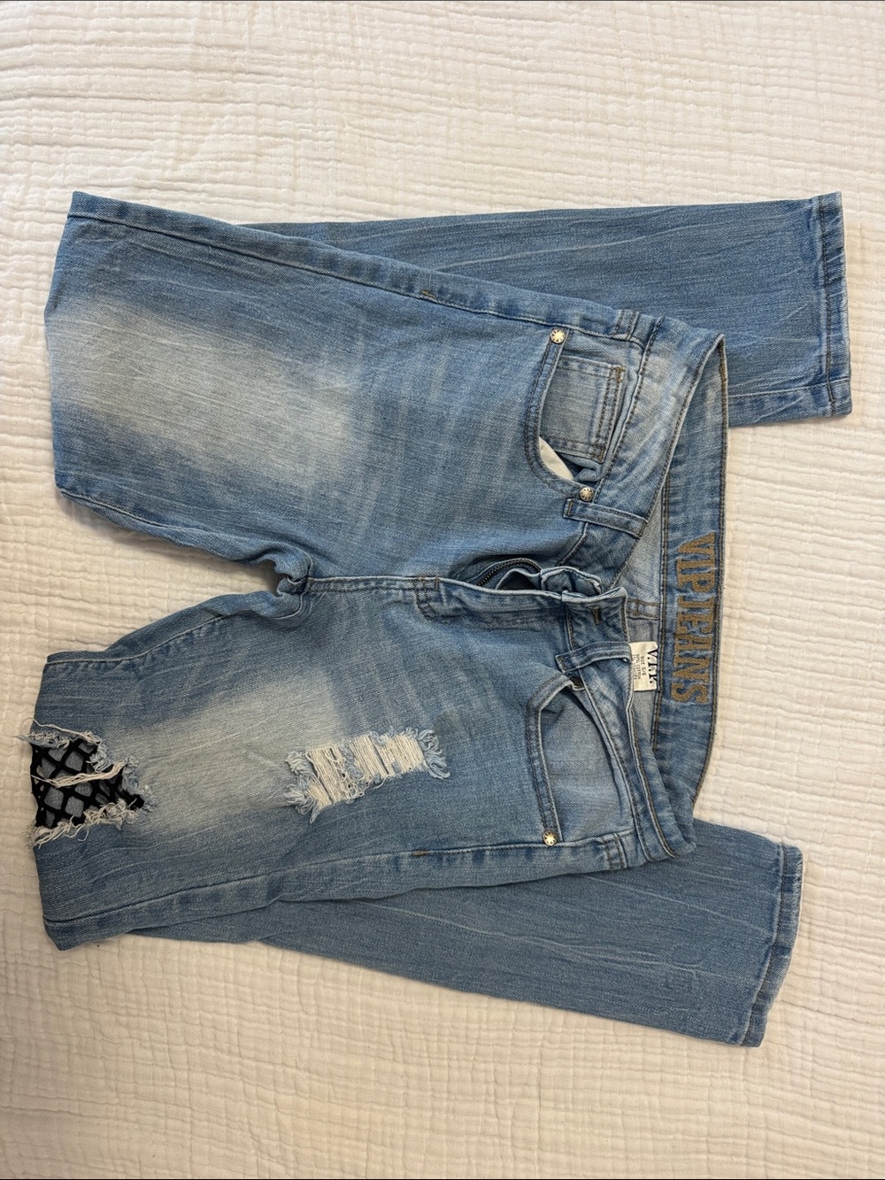 Womens Light Blue Distressed Jeans